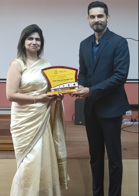 Dr. Minakshi Tyagi receiving PCET Excellence Award